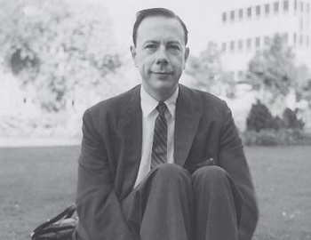 Andrew Gleason seated on a lawn, 1959