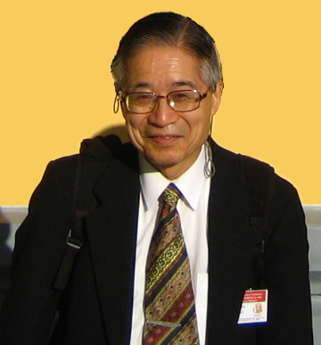 Photograph of Huzihiro Araki at a conference